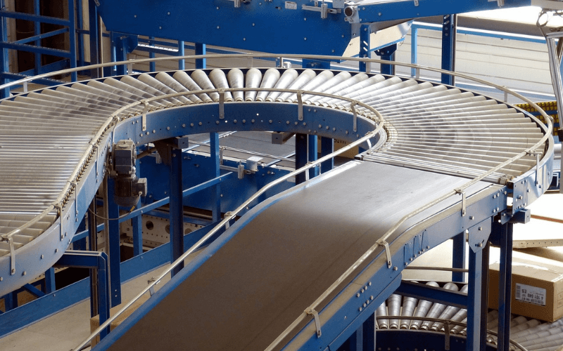 Warehouse safety don't sit on conveyor belt